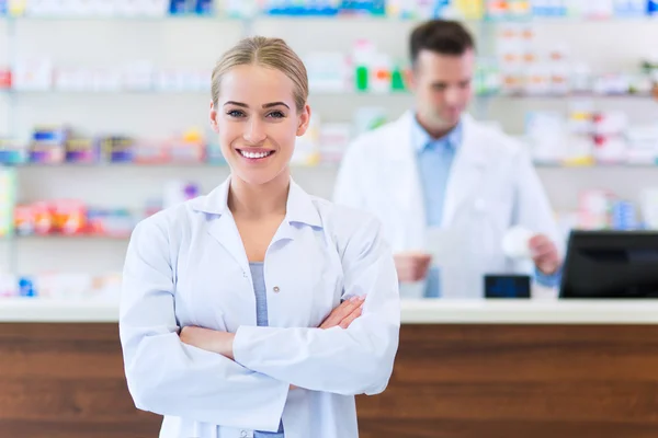 depositphotos_109159660-stock-photo-female-and-male-pharmacists