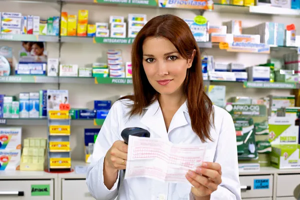 depositphotos_22801316-stock-photo-happy-pharmacist-at-work